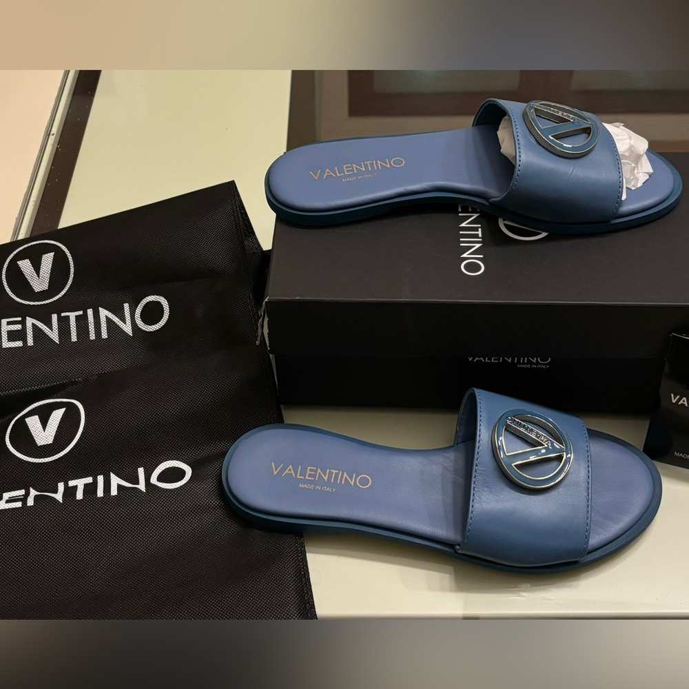 Valentino slides sides 8